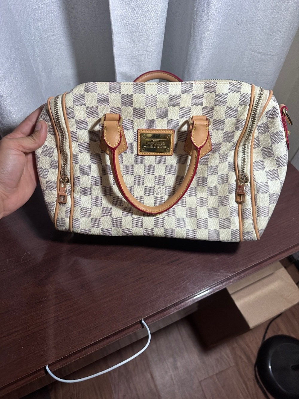 The Louis Vuitton Speedy Bandoulière Womens Handbag.